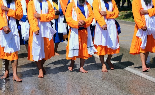 adherents of the Sikh religion during a march on the barefoot