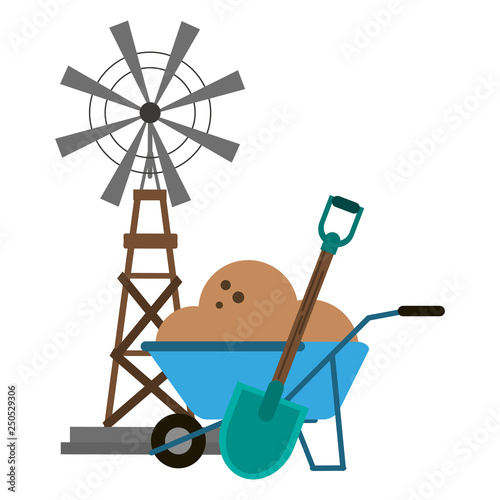 windmill and wheelbarrow with ground