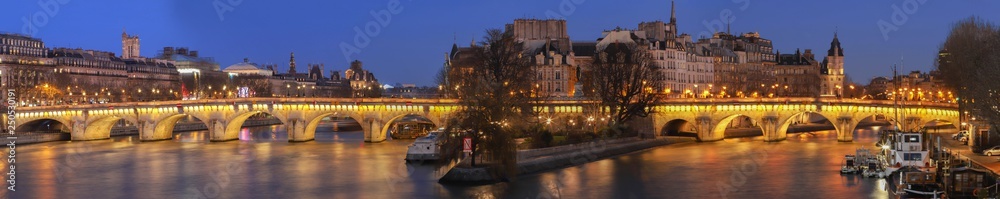 View of the Pont Neuf across the river Seine in Paris at night , France. - obrazy, fototapety, plakaty 