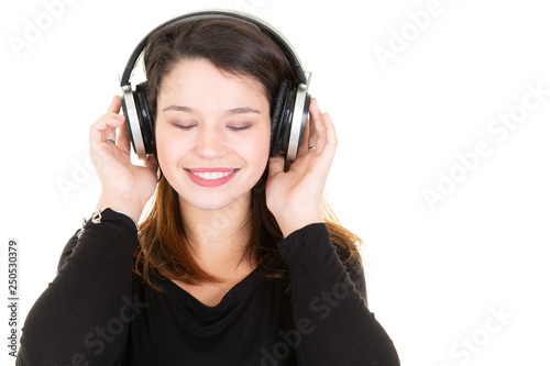 young woman closed eyes listening to music