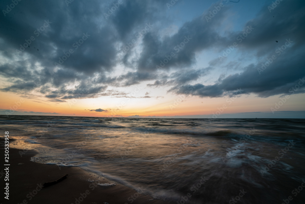 colorful sunset on the sea beach in summer