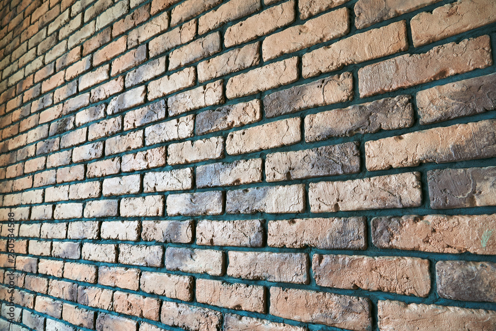 Naklejka premium Details of a decorative red brick wall.