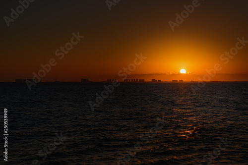 Sunset on the Caribbean Sea. Orange shades. © Kai Grim