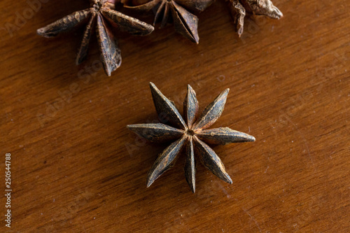 Macro of star anise on wooden table