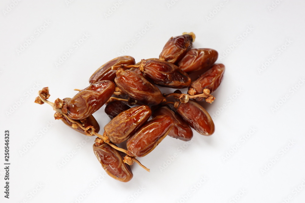 The Dates on the twig, white background The Dates on the twig, white background