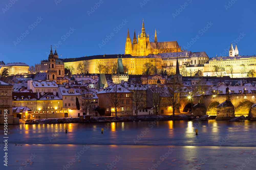 Prague gothic Castle with the Lesser Town and Charles Bridge above River Vltava in the Night, Czech Republic Prague gothic Castle with the Lesser Town and Charles Bridge above River Vltava in the Night, Czech Republic