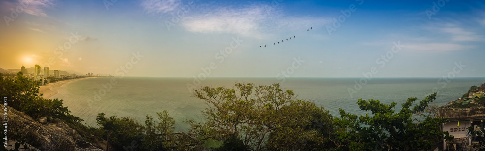 Hua Hin panorama view including sandy beach, green mountain, landscape, cityscape, cloudscape, blue sky scape and seascape in Hua Hin beach, Prachuab Khiri Khan, Thailand. Hua Hin panorama view including sandy beach, green mountain, landscape, cityscape, cloudscape, blue sky scape and seascape in Hua Hin beach, Prachuab Khiri Khan, Thailand.