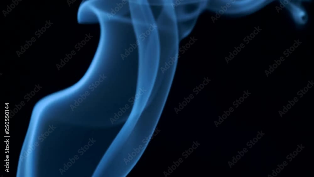 Trickle of smoke slowly rising, graceful twists on black background blowing from bottom to top. Closeup, ProRes, 50 fps Trickle of smoke slowly rising, graceful twists on black background blowing from bottom to top. Closeup, ProRes, 50 fps