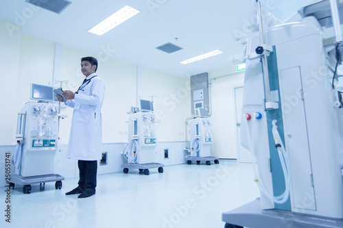 Doctor with modern equipment in the hospital,doctor using digital tablet against equipment,Equipment Dialysis machines in hospitals,Dialysis machines in  hospital   Healthcare and medical concept.