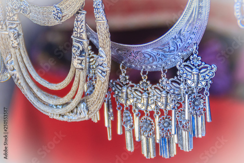 Beautiful traditional Hmong hill tribe silver ornaments for sale as souvenir at Doi Pui’s Hmong ethnic hill-tribe village, Chiang Mai, Thailand.