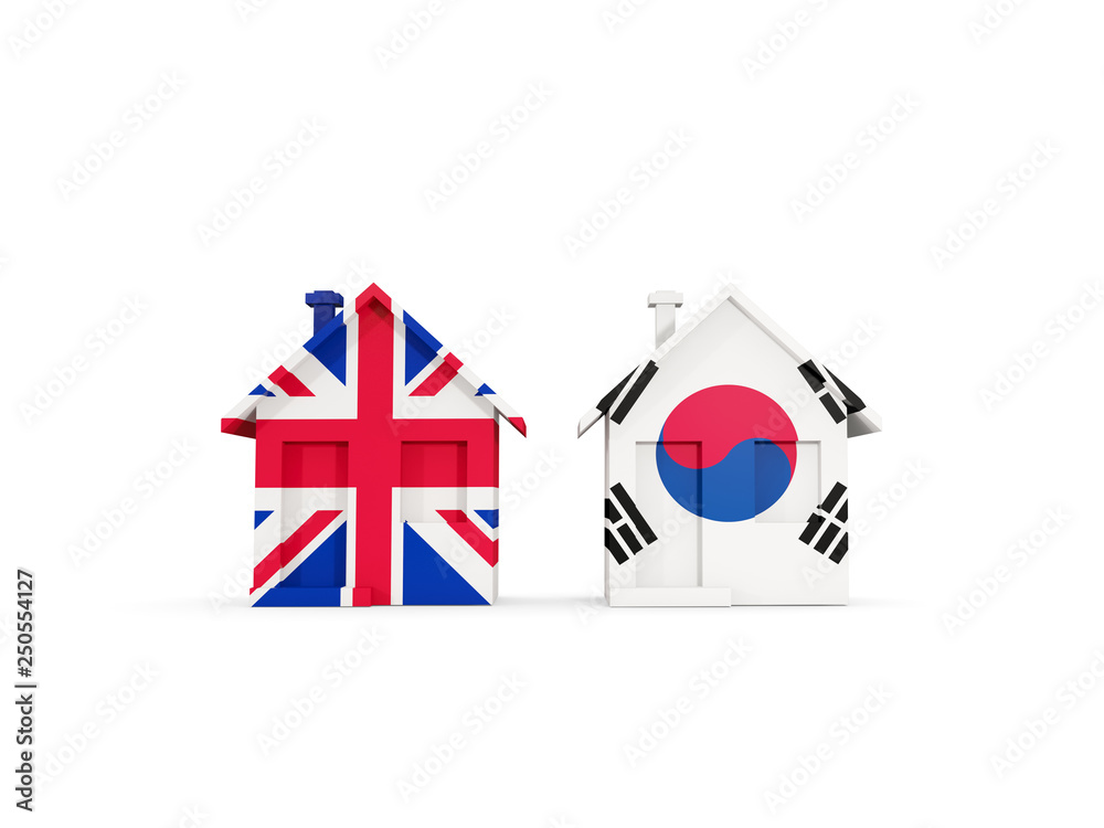Fototapeta premium Two houses with flags of United Kingdom and south korea