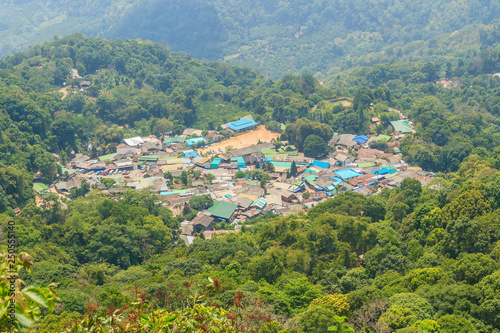 Doi Pui   s Hmong ethnic hill-tribe village  aerial view from the cliff with green forest on the mountain background. Doi Pui Hmong tribal village is located on Doi Suthep-Pui national park  Chiang Mai.