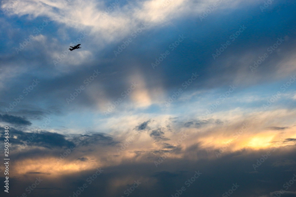 Plane in sunset