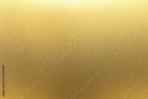 Refraction on gold metal wall texture, abstract background photo