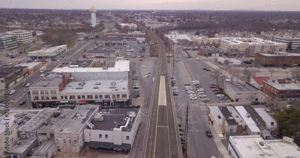 Drone following city train track wide Drone following city train track wide