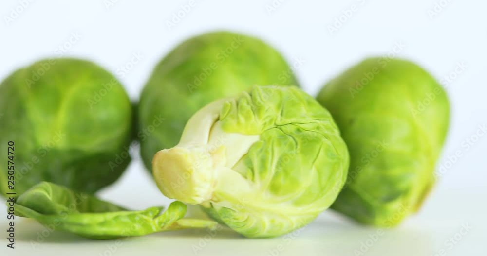 rotation shot of close up fresh green Brussel Sprouts on white background rotation shot of close up fresh green Brussel Sprouts on white background