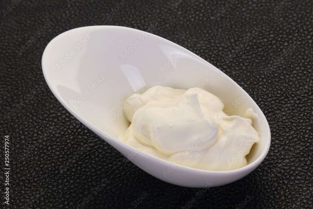 Sour cream in the bowl