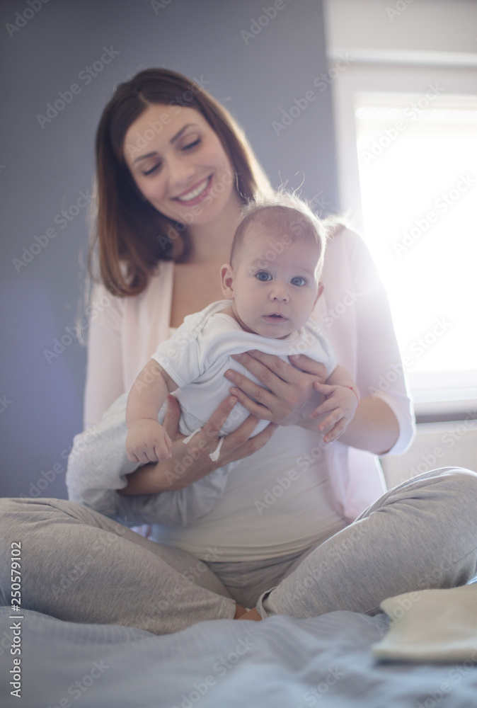 She's proud of her little boy. She's proud of her little boy.