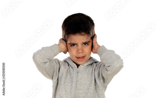 Small child covering his ears