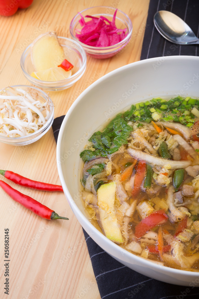 Asian soup of mixed vegetables served with ingredients