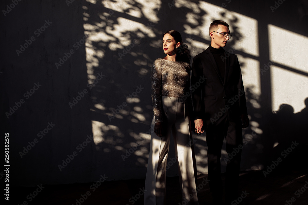 Beautiful couple in classic suits