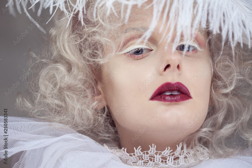 Young attractive woman with platinum blonde and purple lipstick Young attractive woman with platinum blonde and purple lipstick
