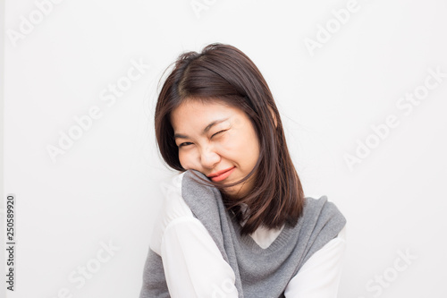 Portrait of smiling beutiful asian women on white background