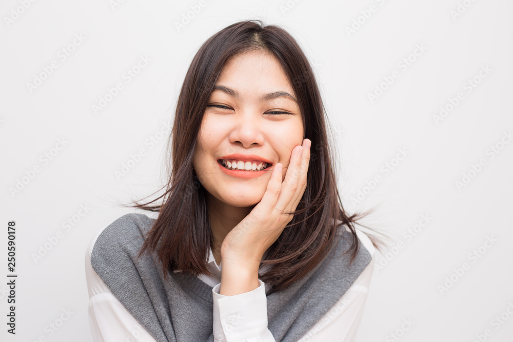 Portrait of smiling beutiful asian women on white background Portrait of smiling beutiful asian women on white background