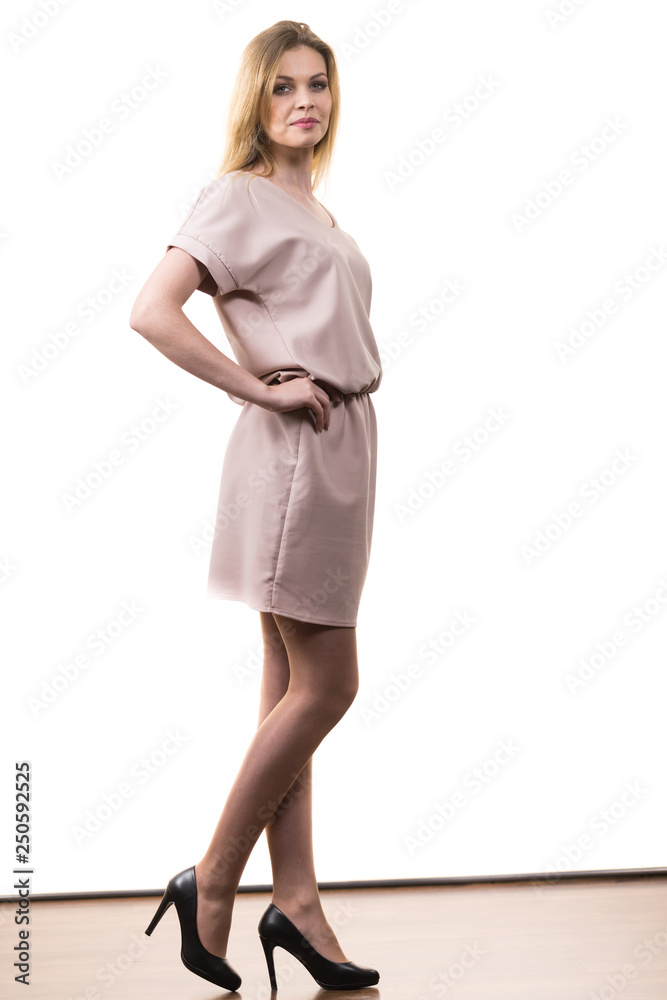Female wearing casual pink tunic dress Female wearing casual pink tunic dress