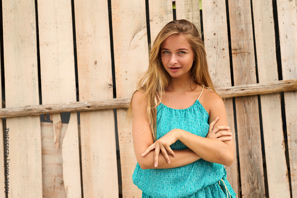 Beautiful blond girl looking at camera