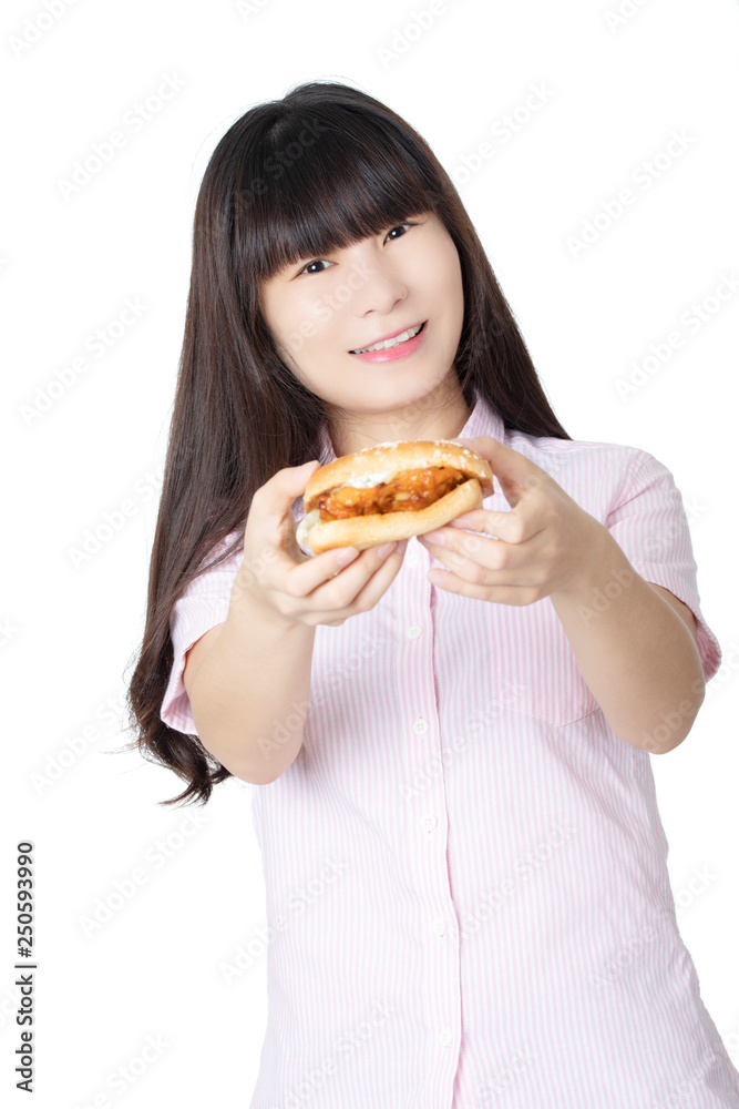 Chinese American woman eating Chicken Sandwich isolated on white background
