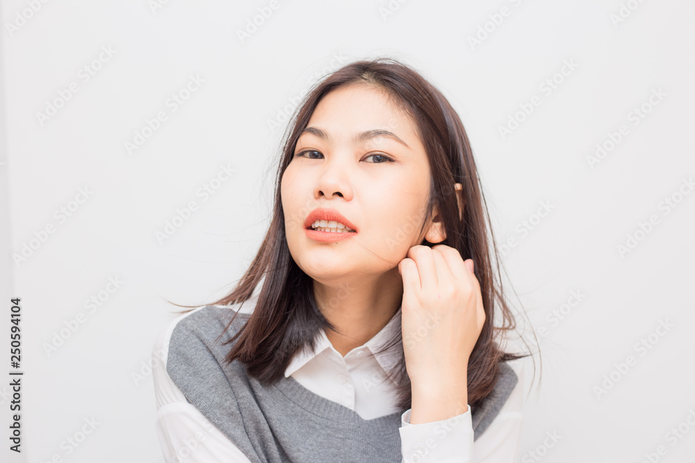 Portrait of smiling beutiful asian women on white background Portrait of smiling beutiful asian women on white background