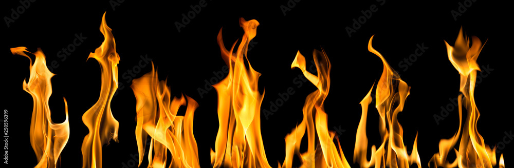 sparks of seven bright yellow flames on black sparks of seven bright yellow flames on black