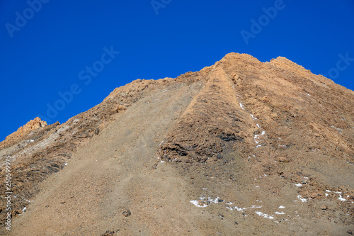 Top of Teide crater against blue sky