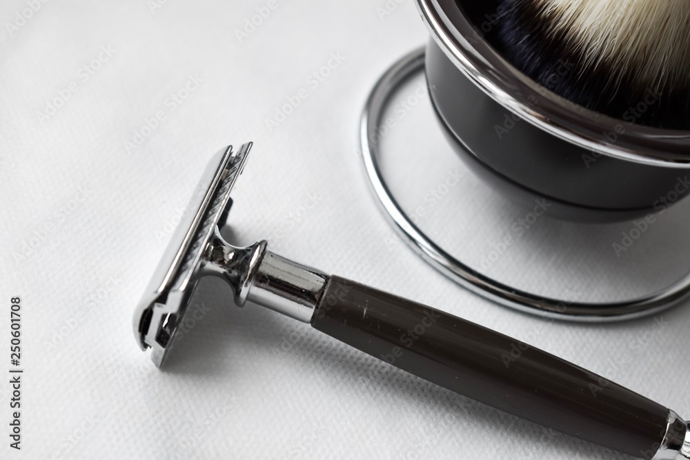 Naklejka premium Shaving kit, shaving machine and foam brush. Shaving items. To shave a man. Shaving. Beard. Shave my hair. To remove the hair.