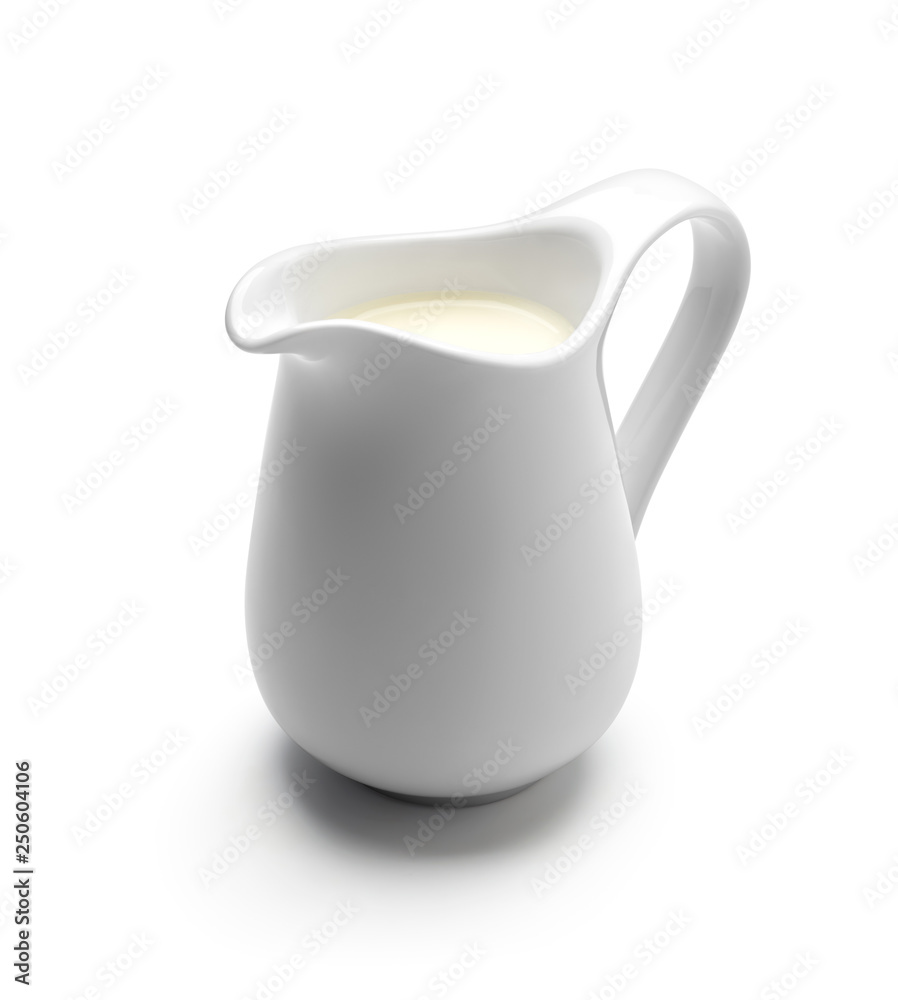 Milk or cream jug isolated on white background Milk or cream jug isolated on white background