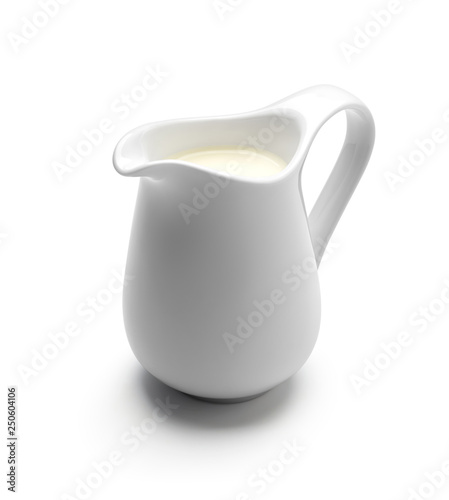 Fotografie Milk or cream jug isolated on white background