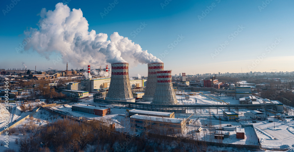 Panoramic view of heavy industry with detrimental impact on nature; CO2 emissions, toxic poisonous gases from chimneys; rusty dirty pipelines and clouds of smoke; one of the world largest steel plant
