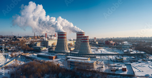 Panoramic view of heavy industry with detrimental impact on nature; CO2 emissions, toxic poisonous gases from chimneys; rusty dirty pipelines and clouds of smoke; one of the world largest steel plant
