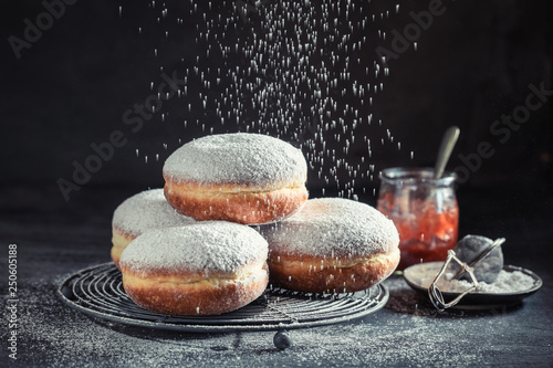Obraz na płótnie Delicious and sweet donuts with powdered sugar