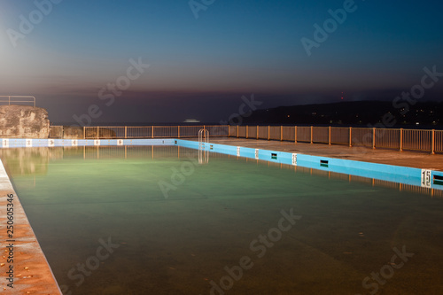 Empty Queenscliff rock pool at dawn.