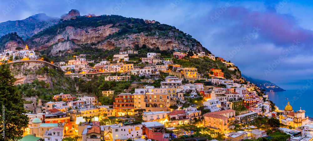 Panoramic  sunset view of colorful buildings in Positano at  Amalfi Coast, Italy.
