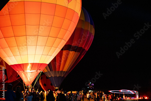 Canvas Print CHIANGRAI , THAILAND - February 15, 2019 : Vivid hot air ballons in the dark nig