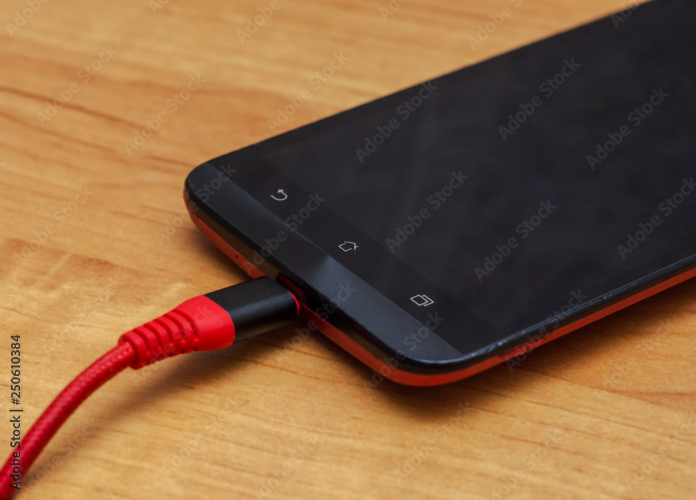 smartphone on charge smartphone on charge