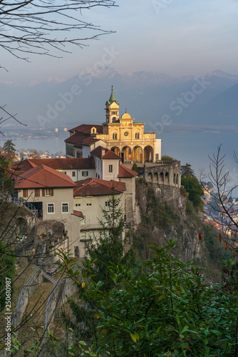 View of Madonna del Sasso Church above Locarno city and the Maggiore lake in Ticino, Switzerland