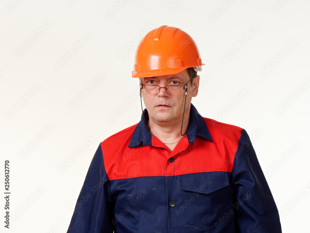man in builder overalls on white background. man in builder overalls on white background.