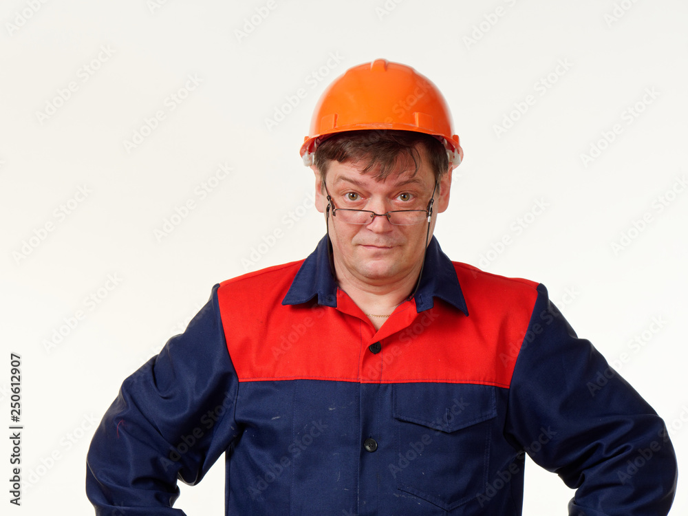 man in builder overalls on white background. man in builder overalls on white background.