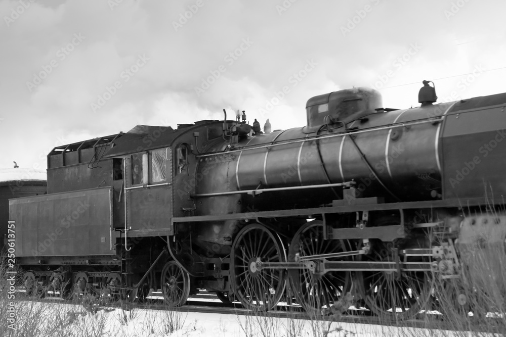 Old retro steam train at winter morning in Finland. WB photo Old retro steam train at winter morning in Finland. WB photo