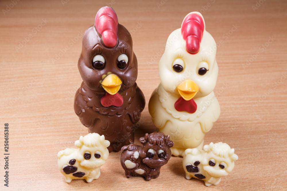 Chocolate cows and chicken made in white and milk chocolate for easter Chocolate cows and chicken made in white and milk chocolate for easter