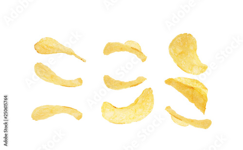 Potatoes becomes potato chips isolated on white background